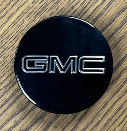 2 5/8" GMC Acadia, Canyon Black Center Cap #84388508 single