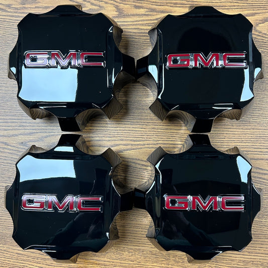 7" GMC Sierra 2500, 3500 OEM Black Center Cap #84627947 set