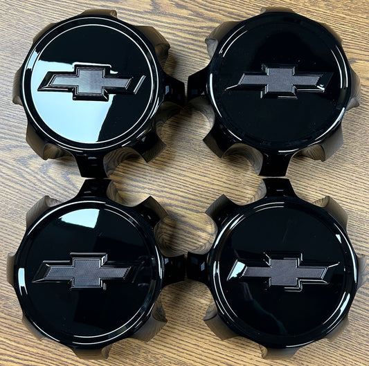 7" Chevrolet Silverado 2500, 3500 Gloss Black OEM Center Cap 23378307 Set