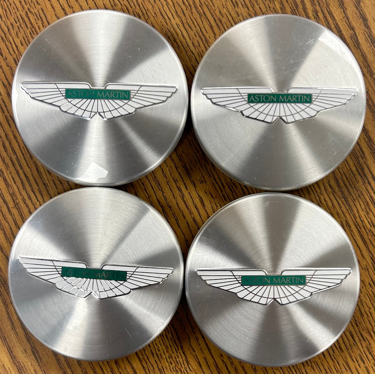 140mm Aston Martin DB9 Volante OEM Brushed Silver Center Caps #6G331A096AA set
