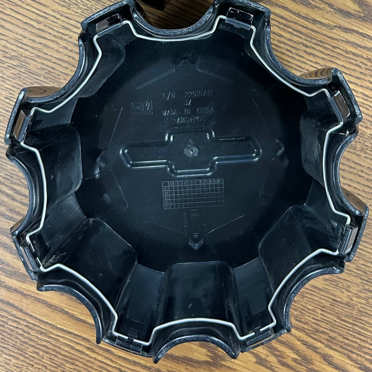 6 7/8" Chevrolet Silverado 2500, 3500 SRW Black OEM Center Cap #23494288 single