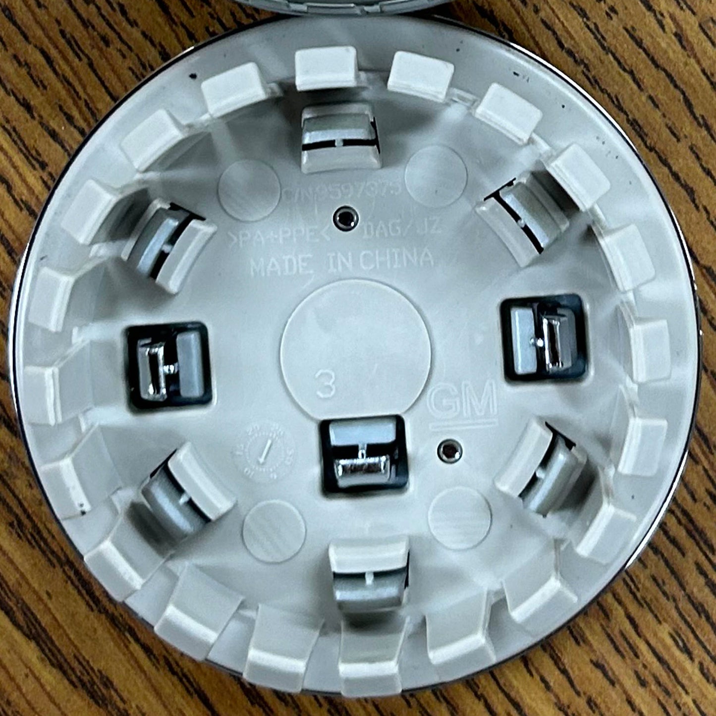 2 5/8" Cadillac Lyriq, XT4 OEM Silver Center Cap #84638166 single