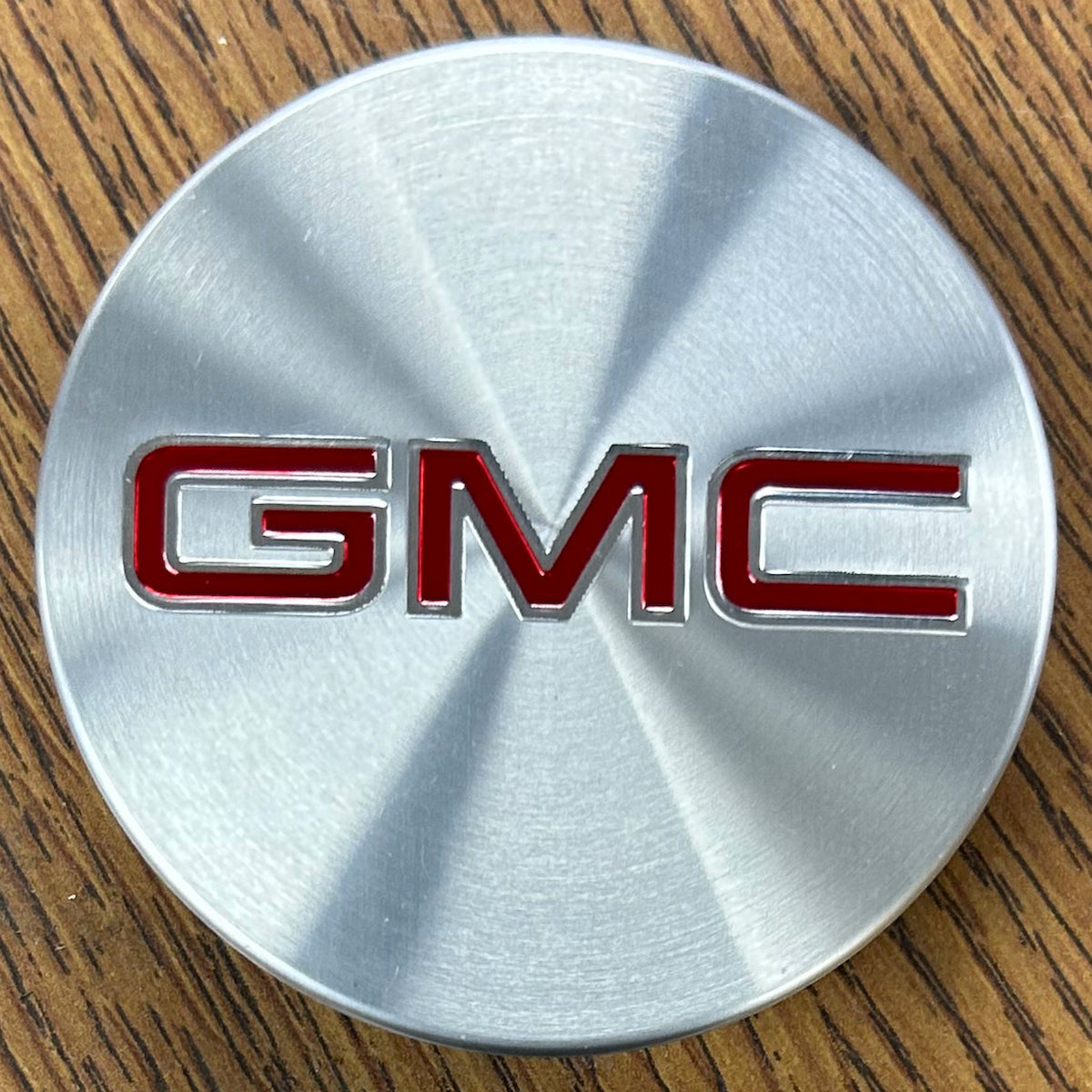 2 5/8" GMC Acadia, Canyon Black Center Cap #52015040 single