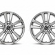 Damaged wheel being evaluated for repair, refinishing, or wheel exchange.