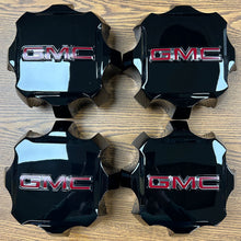 Load image into Gallery viewer, 7&quot; GMC Sierra 2500, 3500 OEM Black Center Cap #84627947 set
