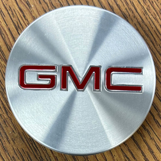 2 5/8" GMC Acadia, Canyon Black Center Cap #52015040 single